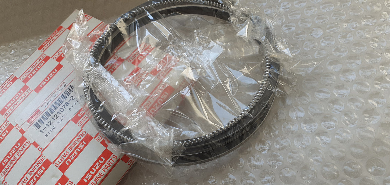 6x Piston Rings Set fits Isuzu 6RB1 1121210782 Genuine View Rear
