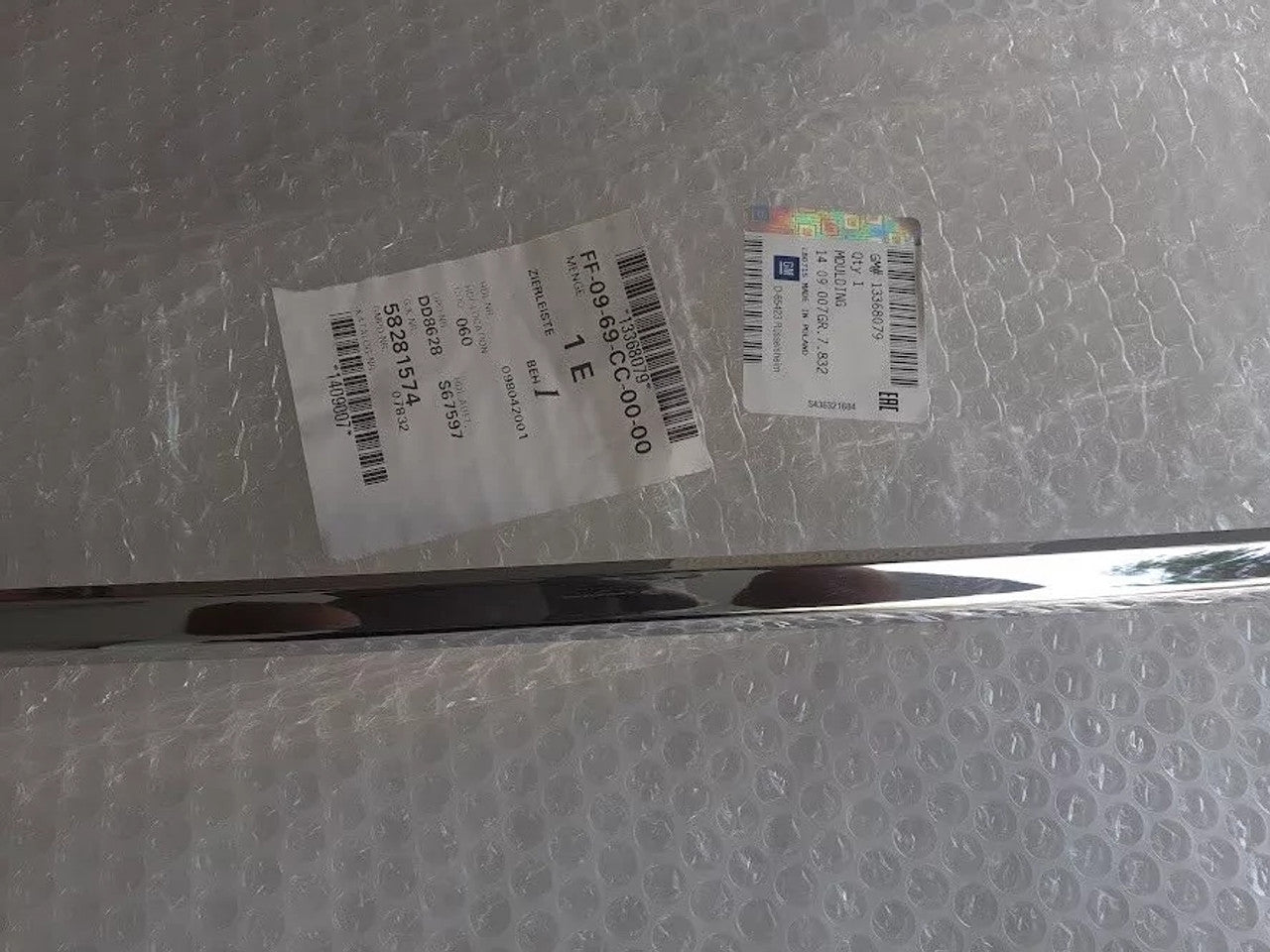 Rear Bumper Molding Centre fits Opel Vauxhall Astra J 13368079 Genuine View Right