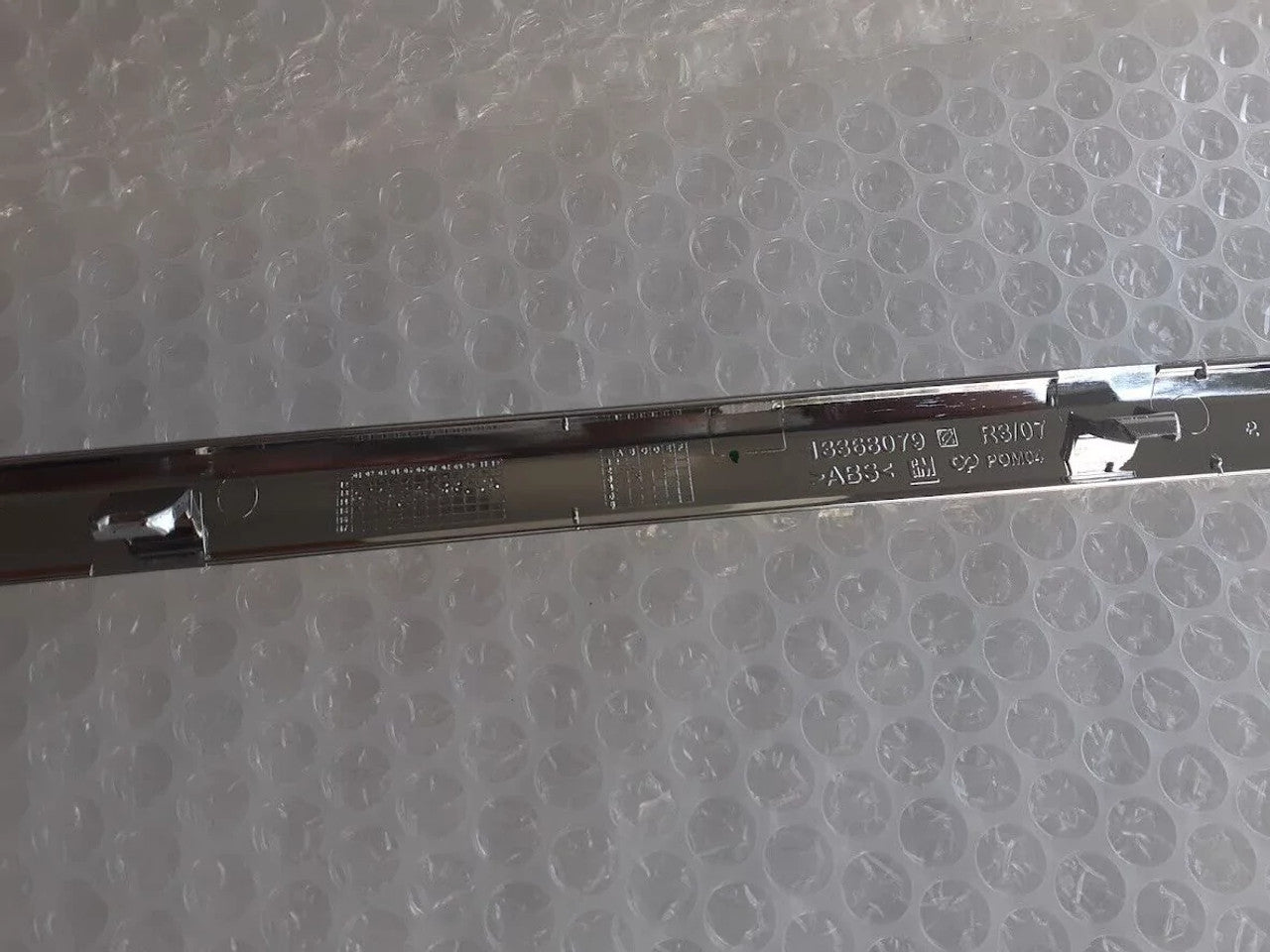 Rear Bumper Molding Centre fits Opel Vauxhall Astra J 13368079 Genuine View Upper