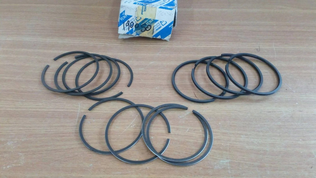 Piston Rings Set fits Fiat Uno Lancia Delta 1900501 Genuine View Rear