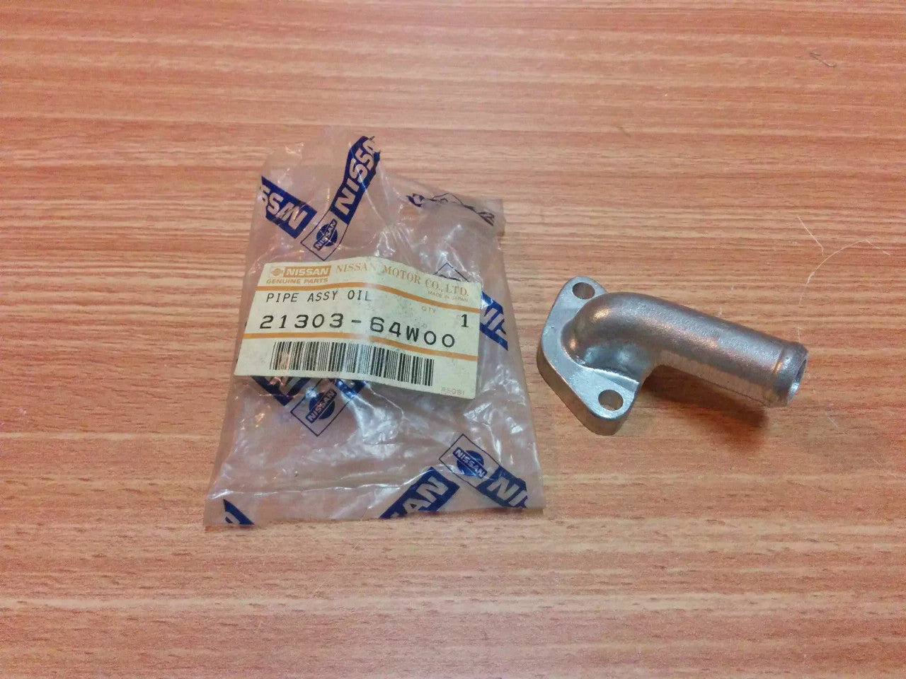 Oil Cooler Pipe fits Nissan Datsun Pickup Truck 720 D21 SD23 SD25 Genuine 21303-64W00 View Front