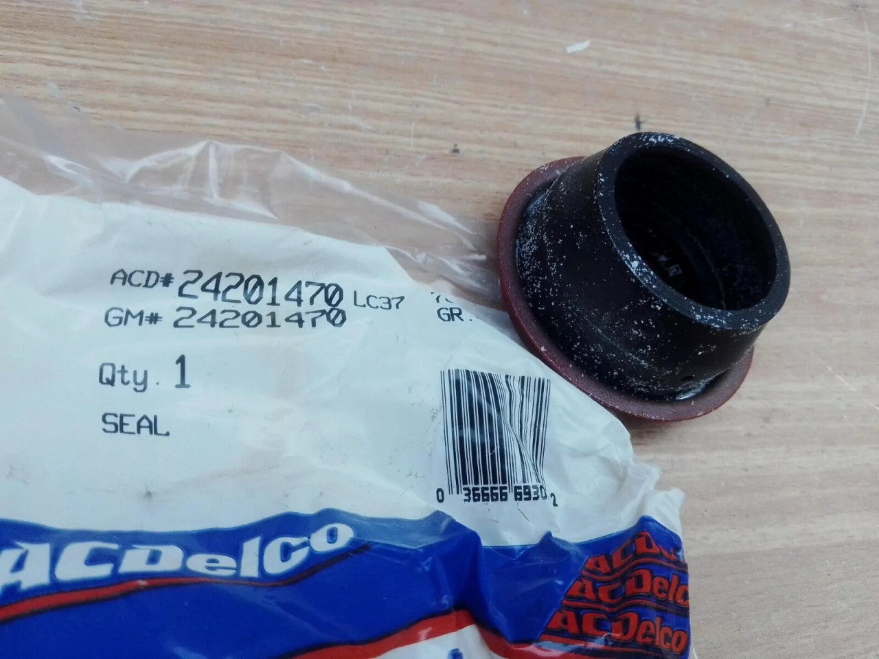 A/T Extension Housing Seal fits Chevrolet Blazer GMC Jimmy 24201470 Genuine View Front