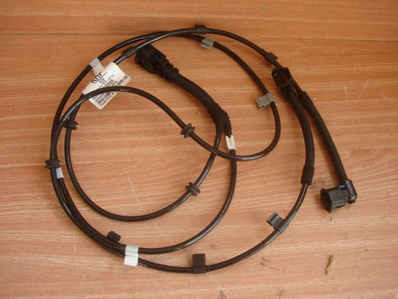 ABS Sensor Wheel Speed Rear Drum fits Opel Vauxhall Astra H 24467412 Genuine View Front