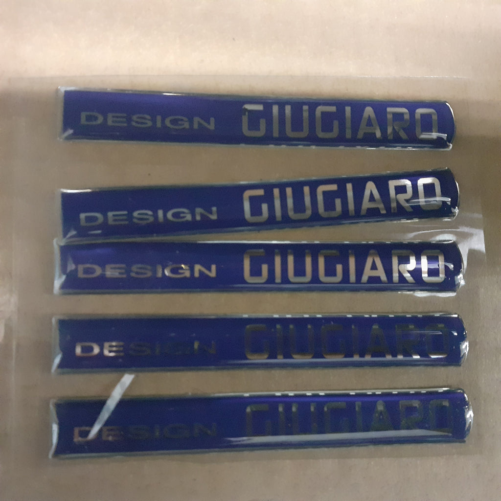 Door Emblem DESIGN GIUGIARO fits Iveco Alfa Romeo Fiat Lancia 3802740 Genuine View Front