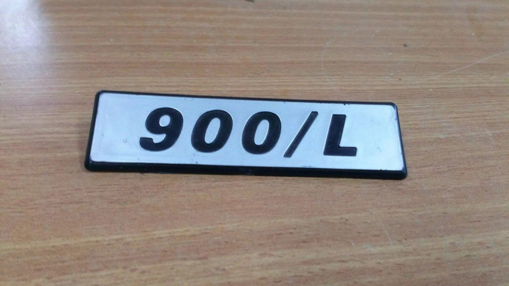 Emblem 900/L fits Fiat 127 4396642 Genuine View Front