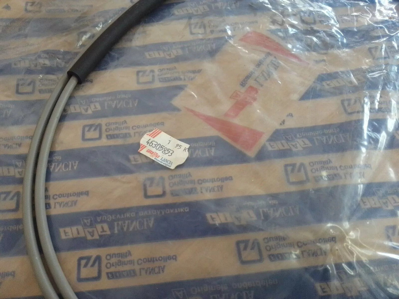 Trunk Lid Release Cable RHD fits Fiat Coupe 46305853 Genuine View Rear