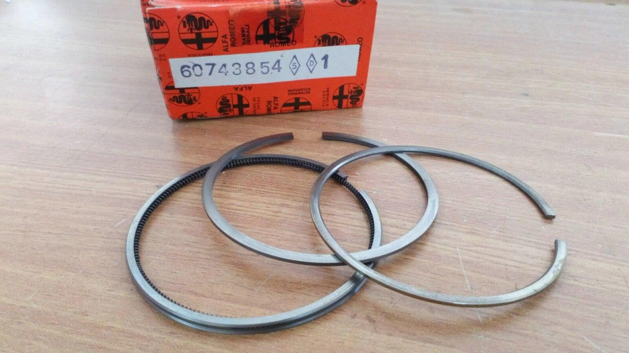 1 Cylinder Piston Rings fits Alfa Romeo 75 60743854 Genuine View Front