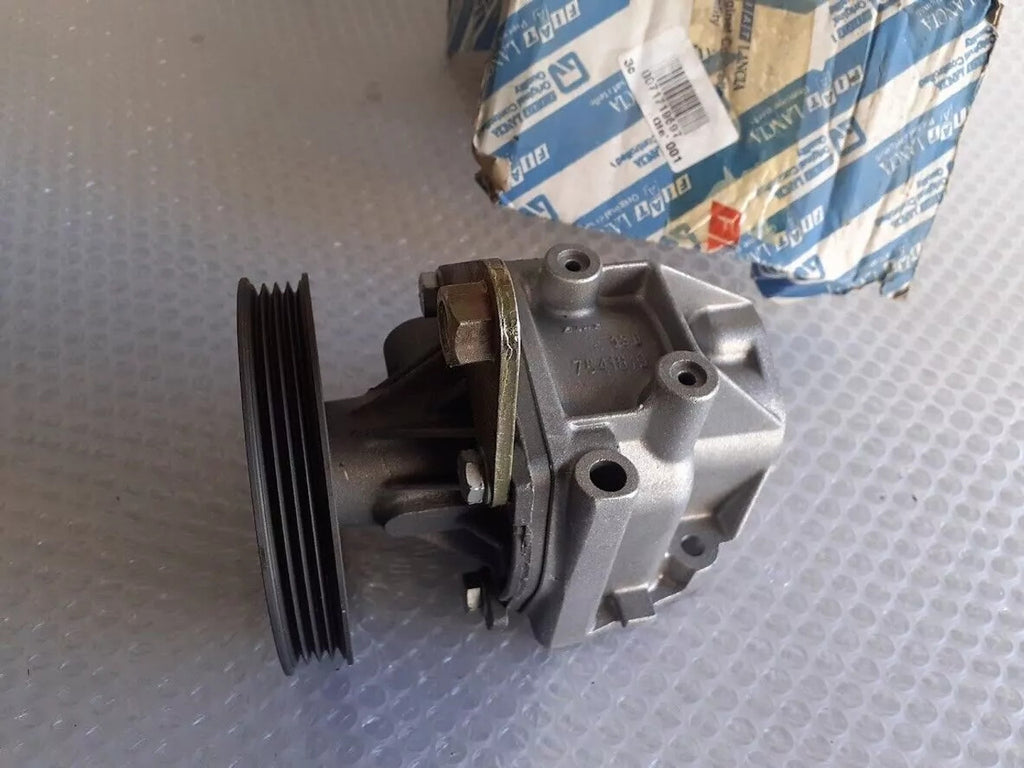 Water Pump with Housing fits Fiat Mille Tempra Tipo 71719697 Genuine View Front