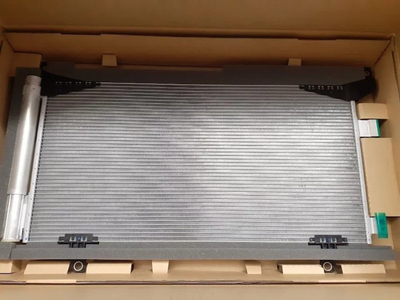 Condenser fits Subaru Forester 73210SG011 Genuine View Front