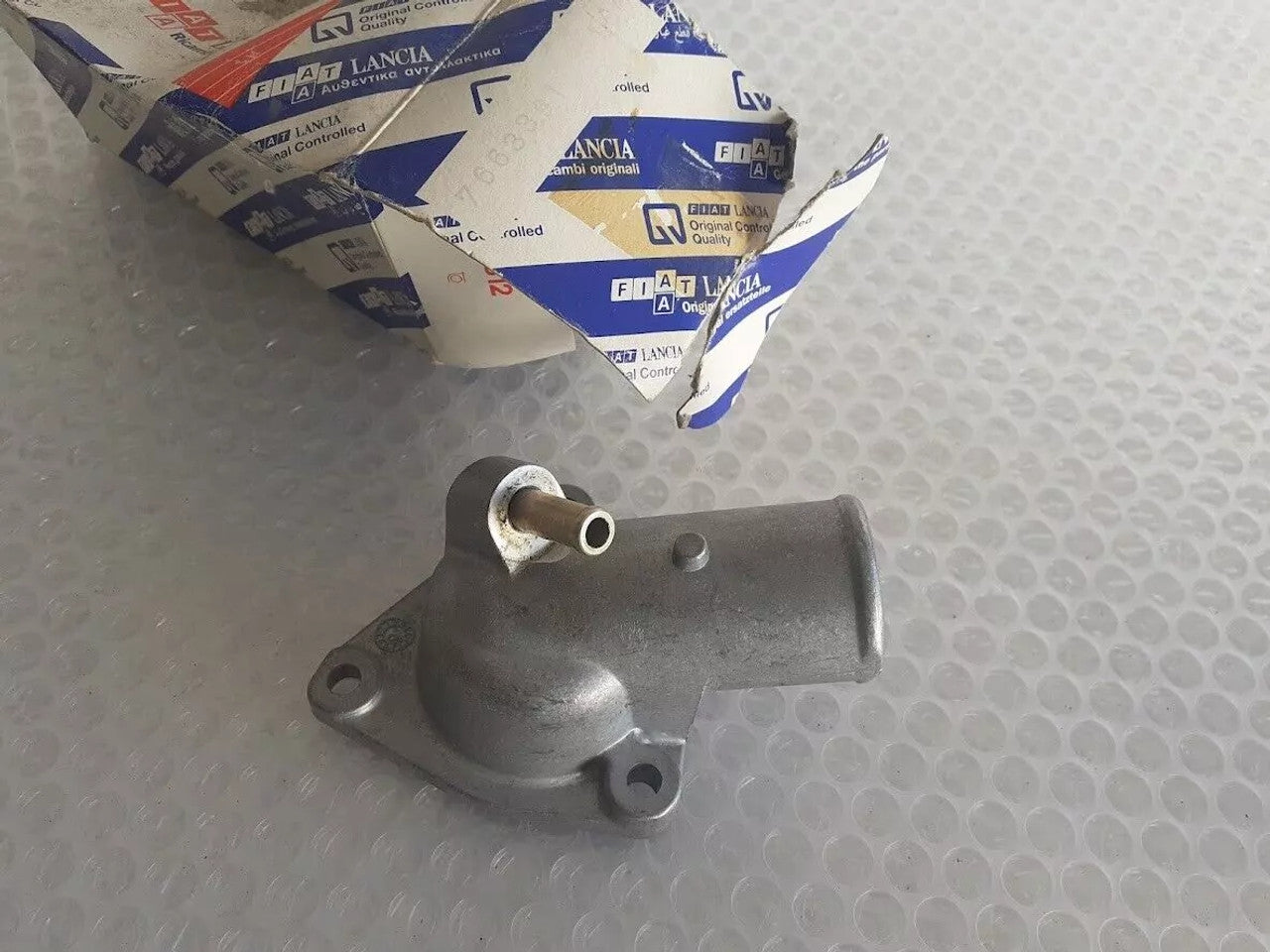 Thermostat Housing Upper Cover fits Fiat Croma Lancia Thema 7663391 Genuine View Front