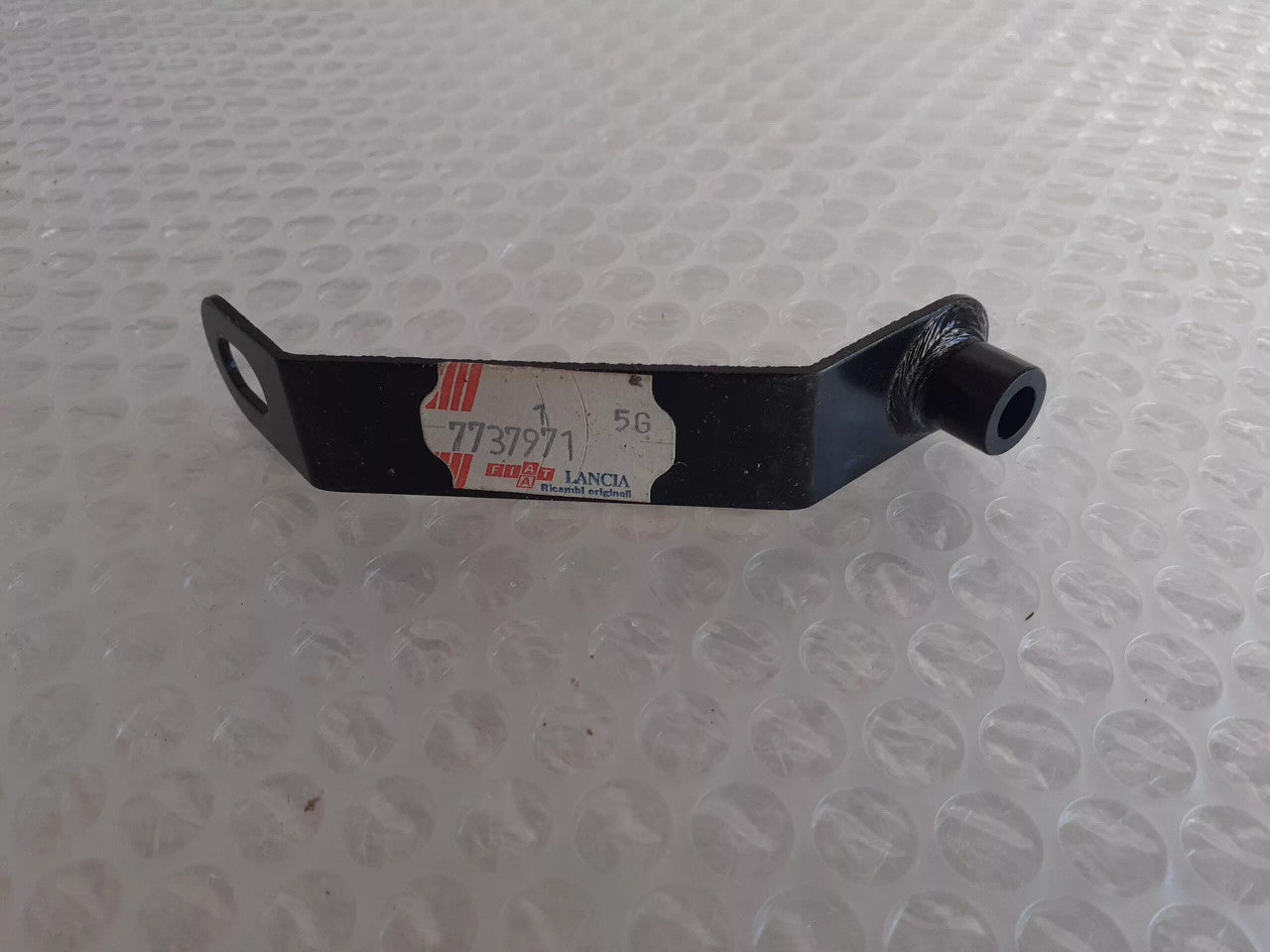 Plate fits Fiat Uno 7737971 Genuine View Front