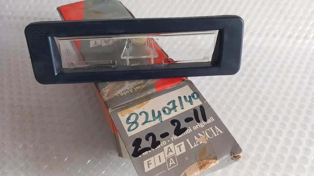 License Plate Light fits Lancia Prisma 82407140 Genuine View Front