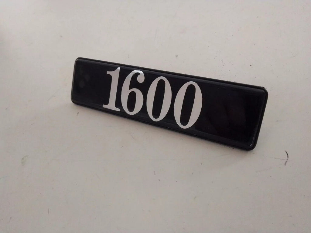 Emblem 1600 fits Lancia Delta 82434765 Genuine View Front