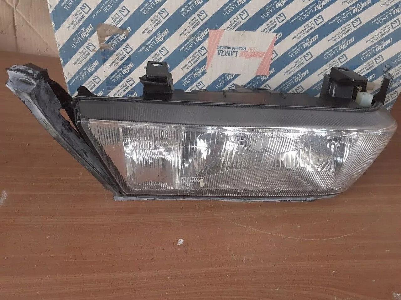 Headlight Front Right RHD fits Lancia Thema 82442627 Genuine View Front