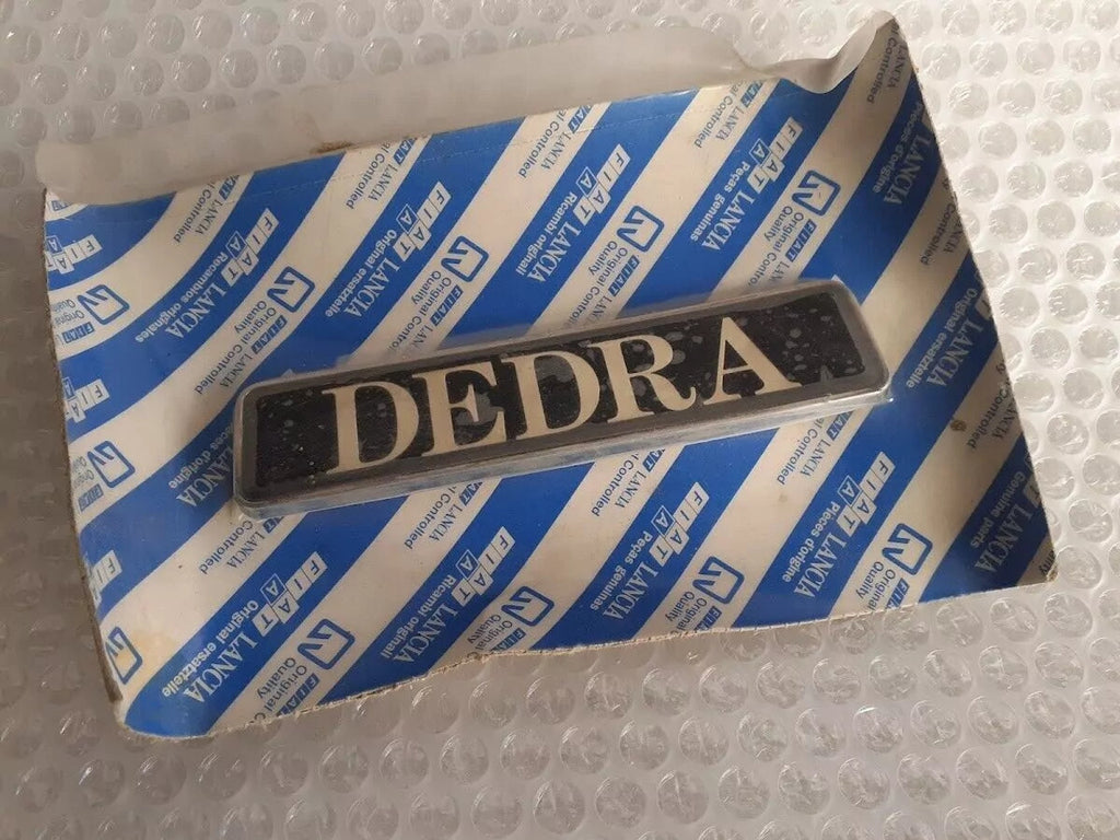 Emblem DEDRA fits Lancia Dedra 82454277 Genuine View Front