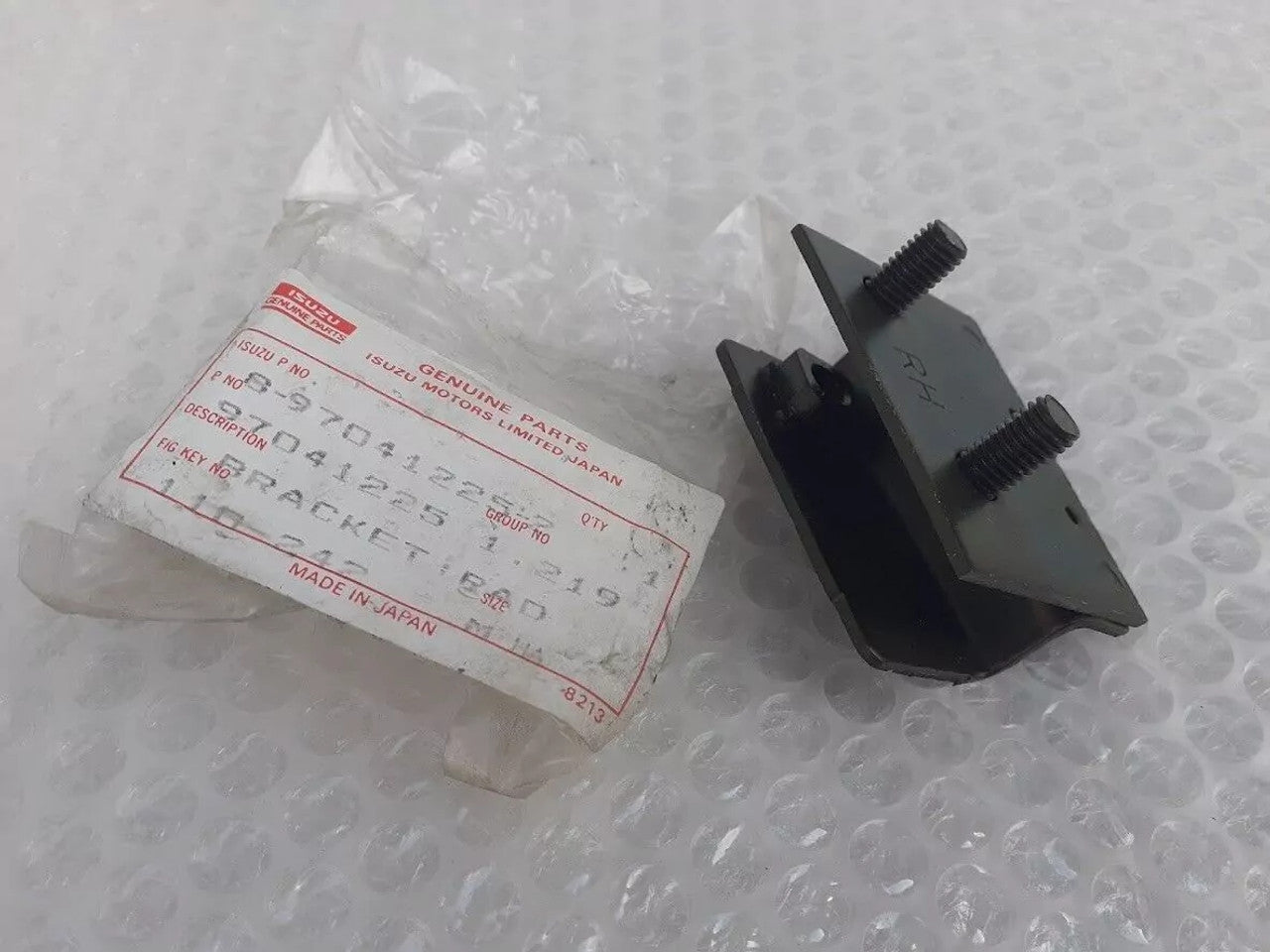 Radiator Bracket Lower Right fits Isuzu Pickup Chevrolet LUV 8970412252 Genuine View Rear