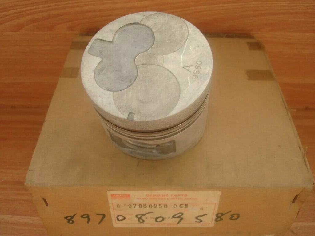 4x Pistons fits Isuzu 4EC1 Opel Corsa A B Vauxhall Nova 15D STD Genuine 8970809580 View Front