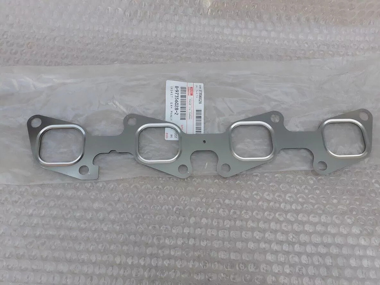 Exhaust Manifold Gasket fits Isuzu Dmax D-Max 4JK1 4JJ1 8973560282 Genuine View Rear