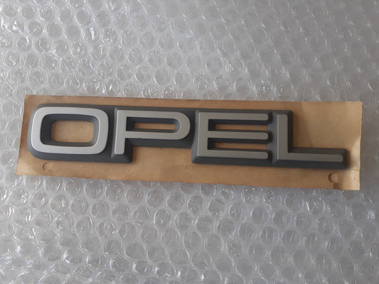 Emblem OPEL Rear fits Opel Kadett E 90227069 Genuine View Front
