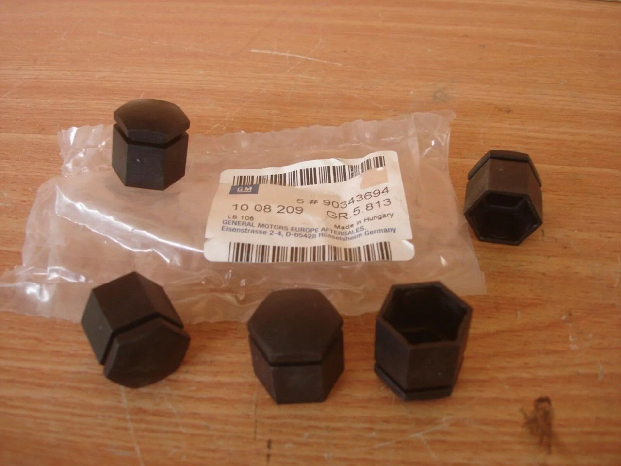 5x Alloy Wheel Nut Covers Black fits Opel Vauxhall 90343694 Genuine View Front