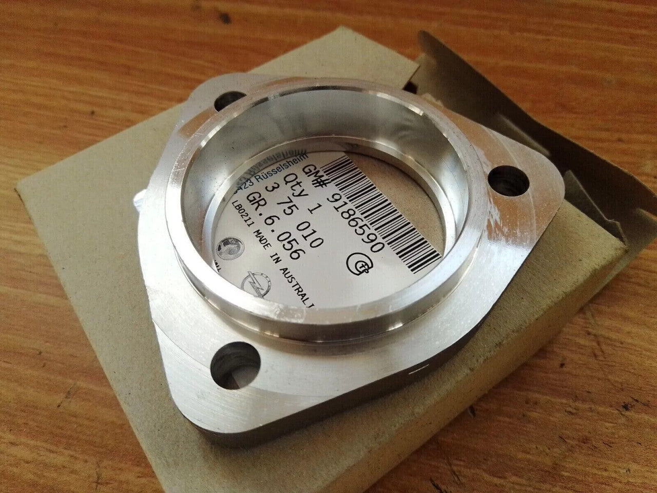 Idle Shaft Bearing Flange fits Opel Vauxhall 9186590 Genuine View Rear