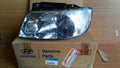 Headlight Left fits Hyundai Matrix 9210317040 Genuine View Front