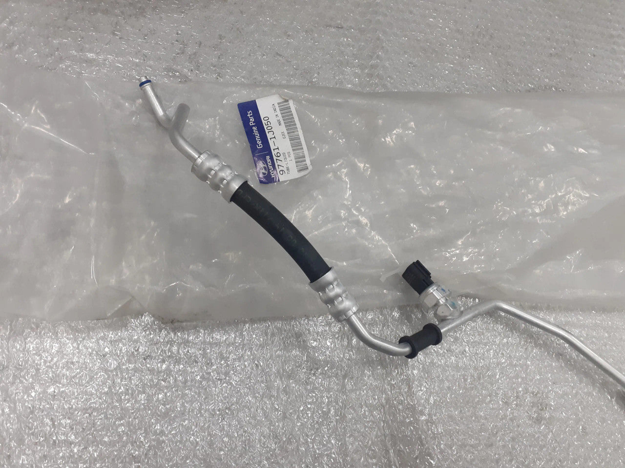 977611J050 Air Condition Pipe fits Hyundai Kia 97761-1J050 Genuine View Left