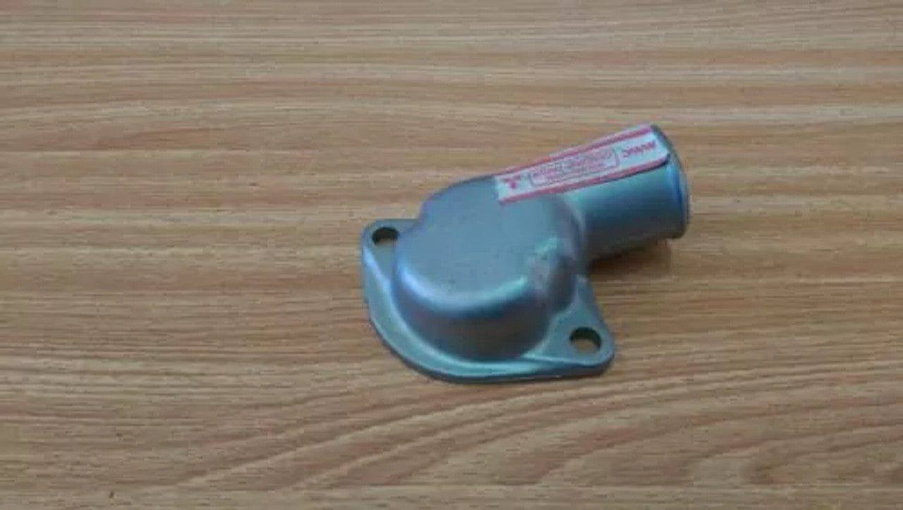 Water Elbow Outlet Thermostat Cover fits Mitsubishi Colt 1100 11 MD010550 View Rear