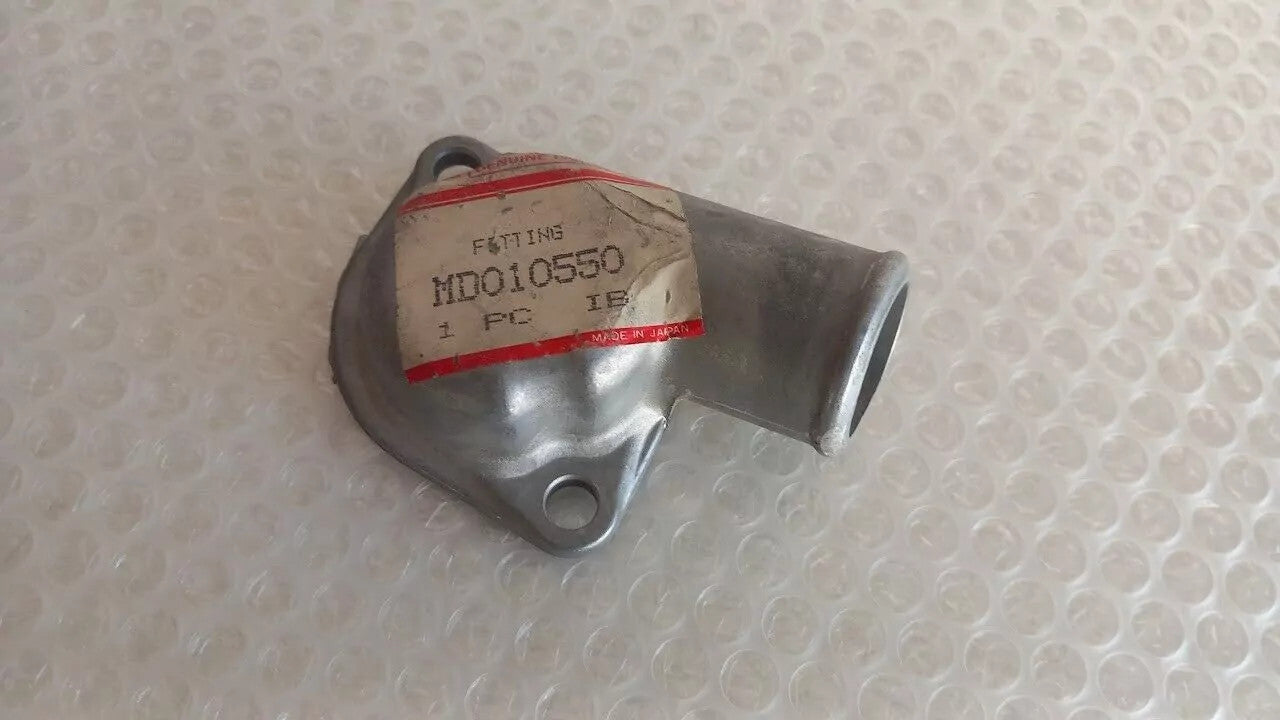 Water Elbow Outlet Thermostat Cover fits Mitsubishi Colt 1100 11 MD010550 View Lower