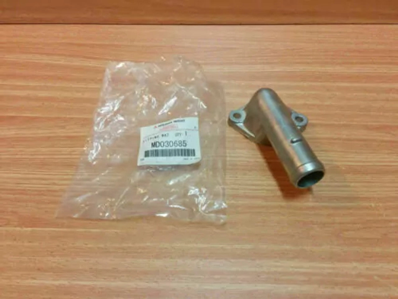 Cooling Water Outlet fits Mitsubishi Colt Lancer Mirage C11A C12A C15A Genuine MD030685 View Front
