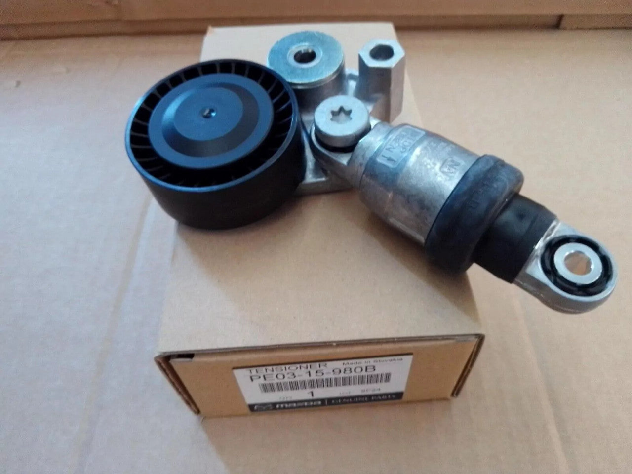 Outer Belt Tensioner fits Mazda PE03-15-980B Genuine View Rear